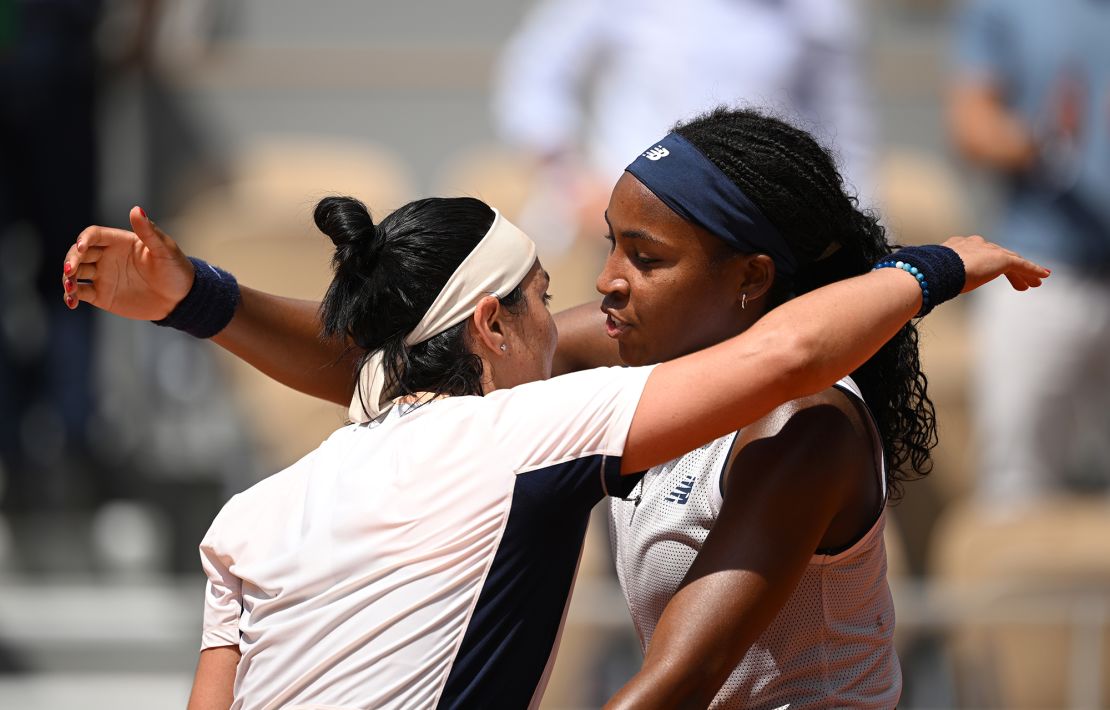 Gauff and Jabeur embrace after the match.