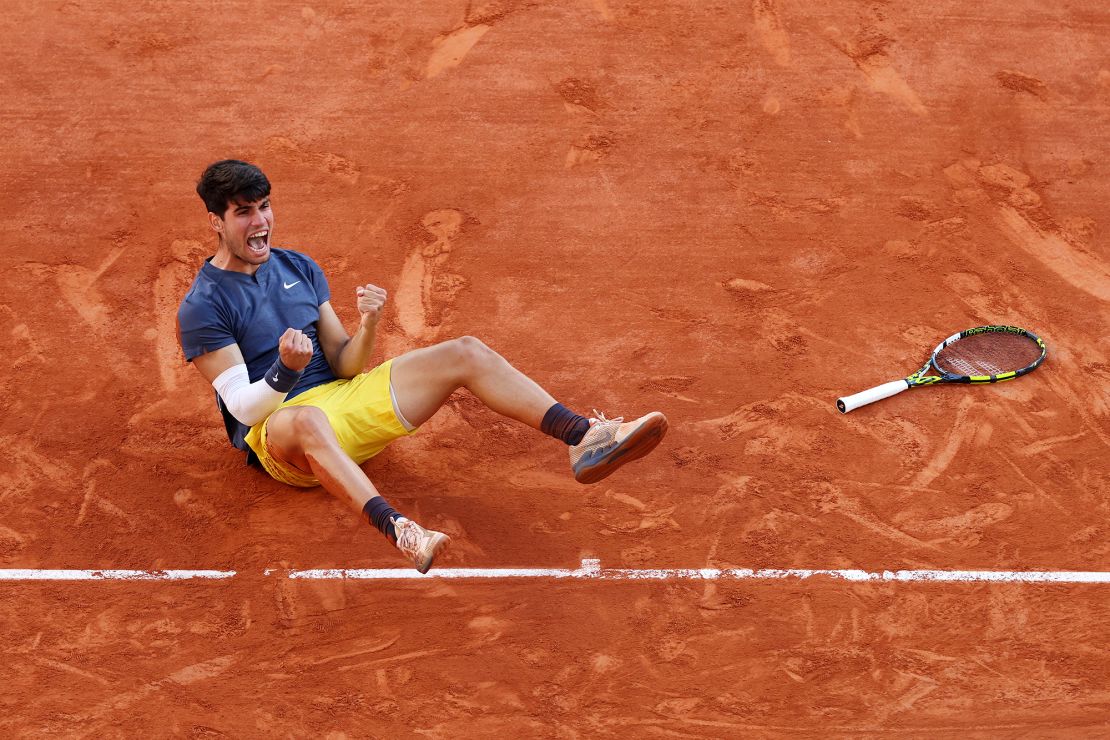 Alcaraz celebrates winning match point against Alexander Zverev in the men's French Open final.