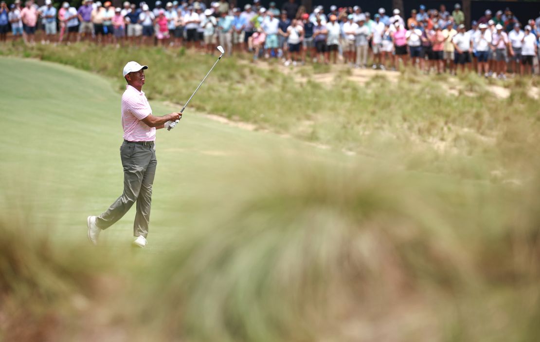 Large crowds flocked to follow Woods.