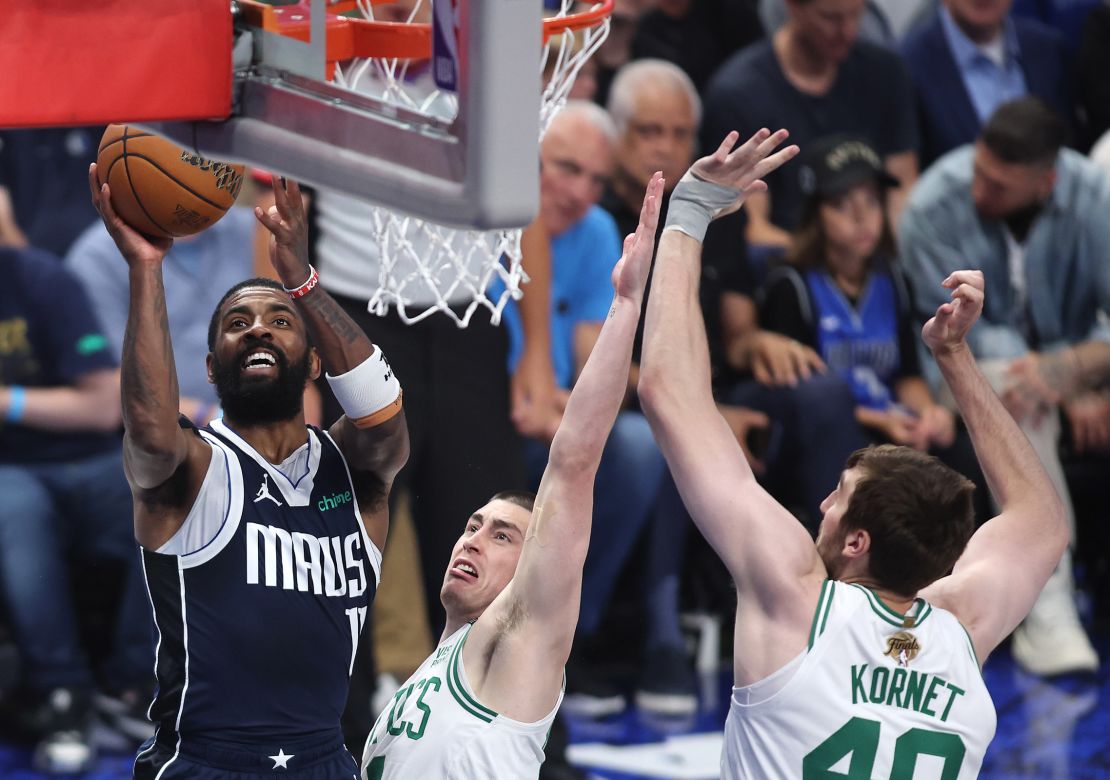 Kyrie Irving of the Dallas Mavericks shoots the ball against the Boston Celtics during Game Four of the 2024 NBA Finals at American Airlines Center in Dallas, Texas, on June 14, 2024.