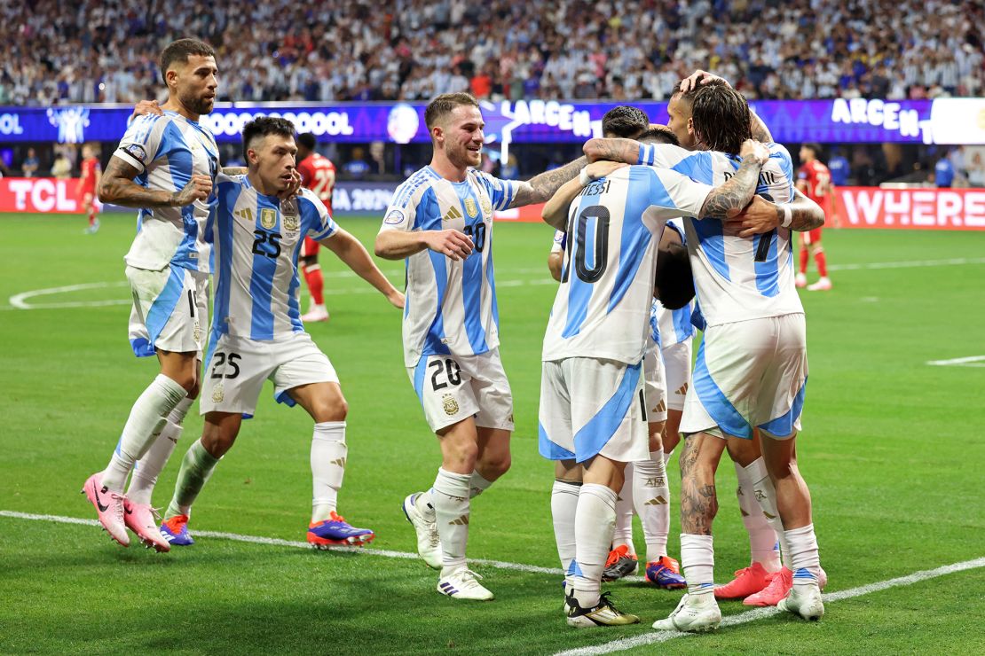 Argentina's players celebrate their second goal against Canada.