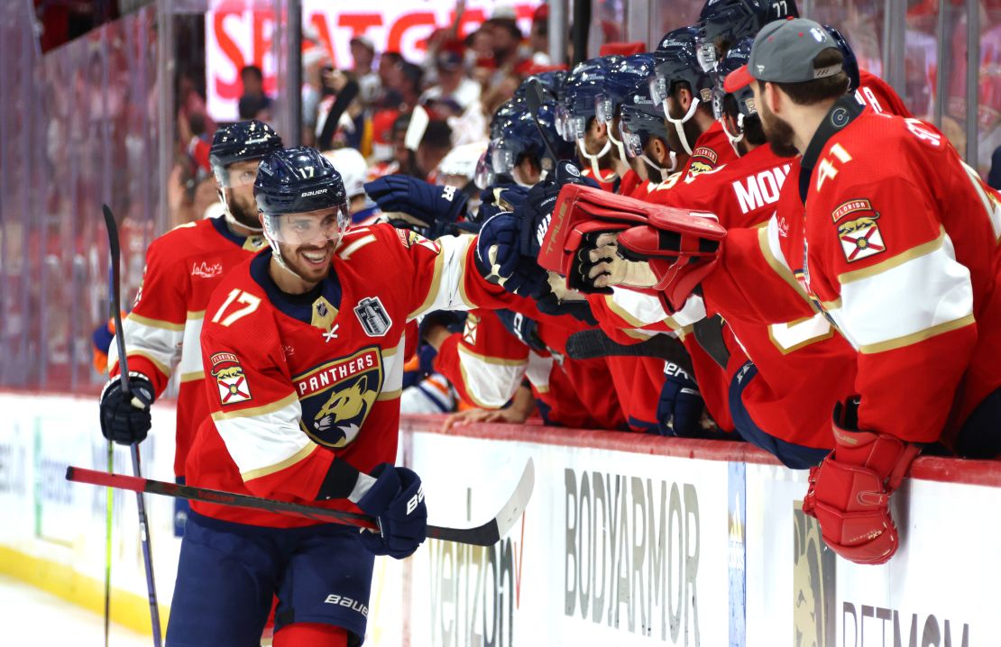 Evan Rodrigues #17 of the Florida Panthers celebrates with teammates on the bench after a goal by teammate Oliver Ekman-Larsson #91 (not pictured) during Game Five of the 2024 Stanley Cup Final.