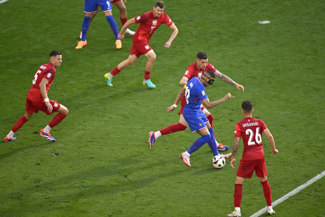 Mbappé wore the mask against Poland.