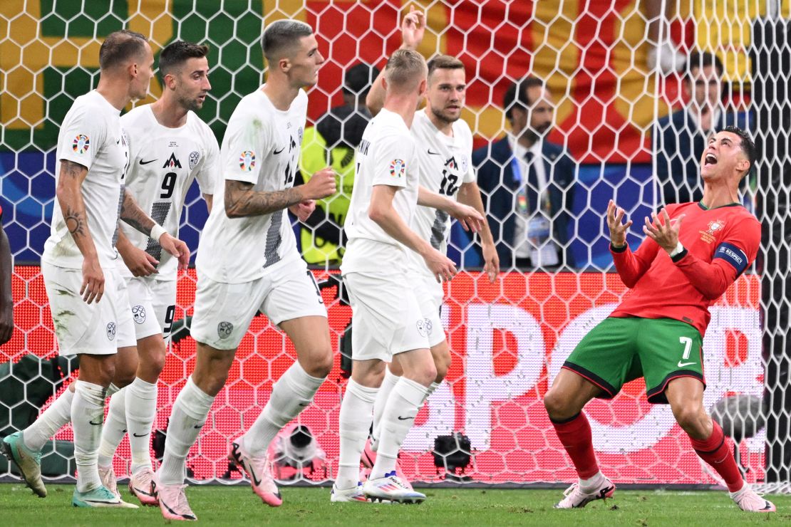 Ronaldo reacts after missing a missed chance against Slovenia.