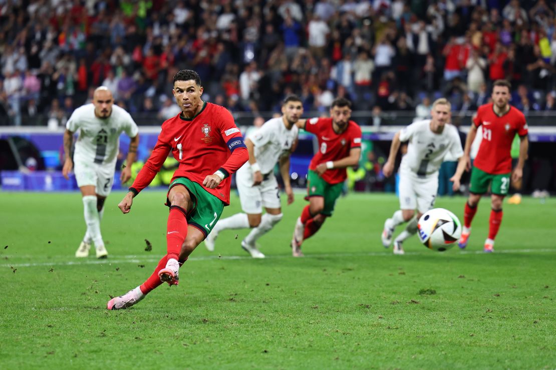 FRANKFURT AM MAIN, GERMANY - JULY 01: Cristiano Ronaldo of Portugal takes a penalty saved by Jan Oblak of Slovenia during the UEFA EURO 2024 round of 16 match between Portugal and Slovenia at Frankfurt Arena on July 01, 2024 in Frankfurt am Main, Germany. (Photo by Robbie Jay Barratt - AMA/Getty Images)