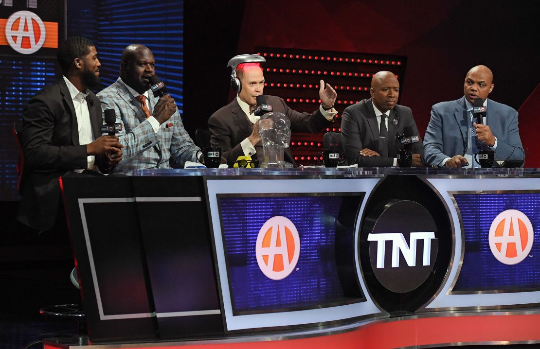 From left, baseball player Dexter Fowler joins TNT's "Inside the NBA" team, Shaquille O'Neal, Ernie Johnson Jr., Kenny Smith and Charles Barkley in Las Vegas in 2017.