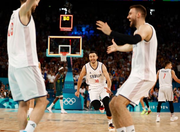 Serbian players celebrate their quarterfinal win over Australia on August 6. <a href="https://www.cnn.com/sport/live-news/paris-olympics-news-2024-08-06#h_9c74de7100be7969d4275ef7b6adaa4a">They came back from a 24-point deficit</a> to win in overtime.