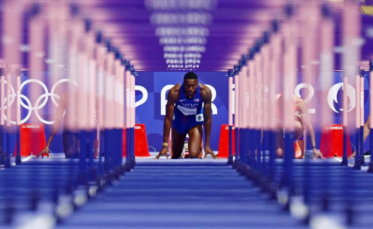 The United States' Grant Holloway prepares to run the 110-meter hurdles on August 4.