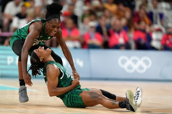 Nigerian basketball players Promise Amukamara, left, and Ezinne Kalu celebrate during their game against Canada on August 4. With a 79-70 win, <a href="https://www.cnn.com/sport/live-news/paris-olympics-news-2024-08-04#h_f985176354f9a228c3c53f8de80a3d4b">Nigeria made history</a> by becoming the first African team — men’s or women’s — to reach the quarterfinal stage of the Olympics.