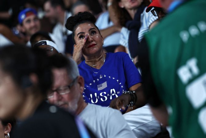 Chiles’ mother, Gina, reacts after watching her daughter’s floor exercise at the Bercy Arena in Paris.