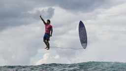 TOPSHOT - Brazil's Gabriel Medina reacts after getting a large wave in the 5th heat of the men's surfing round 3, during the Paris 2024 Olympic Games, in Teahupo'o, on the French Polynesian Island of Tahiti, on July 29, 2024. (Photo by Jerome BROUILLET / AFP) (Photo by JEROME BROUILLET/AFP via Getty Images)