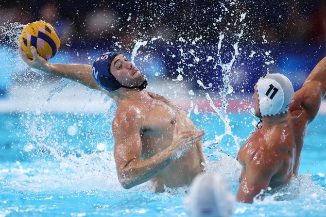 Serbia's Dušan Mandić shoots during a water polo match against Hungary on August 5.