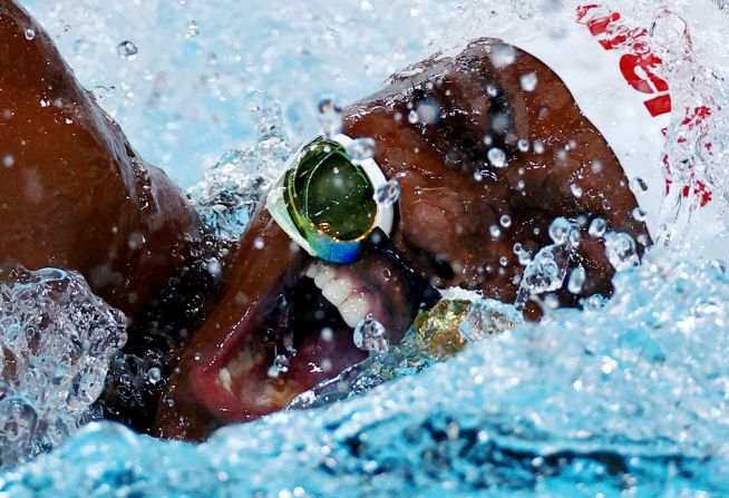 Goggles slide down the face of Congo's Vanessa Bobimbo as she swims in the 50-meter freestyle on August 3.