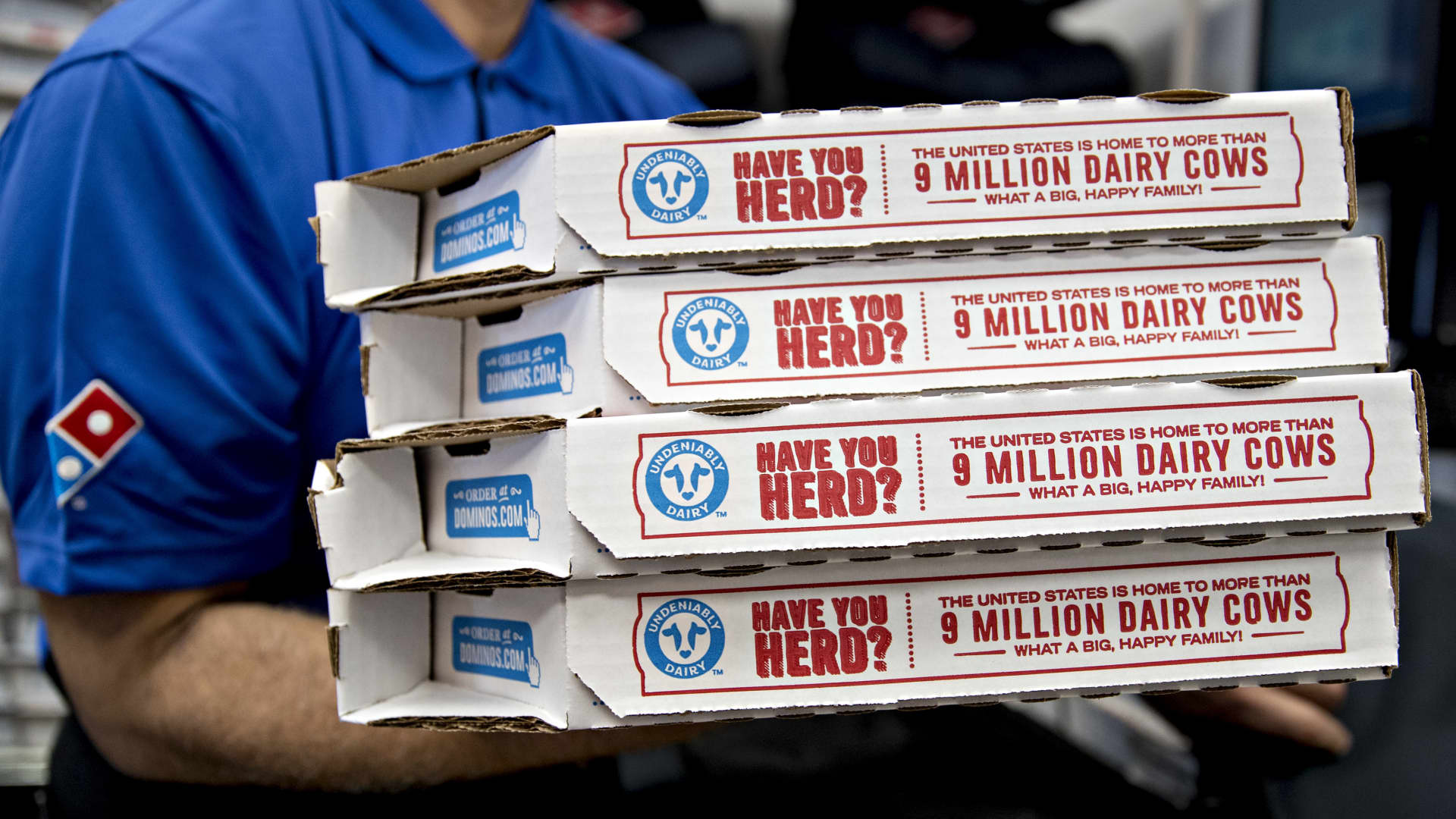 Stocks making the biggest moves premarket: Domino’s, Warner Bros. Discovery, United Airlines and more