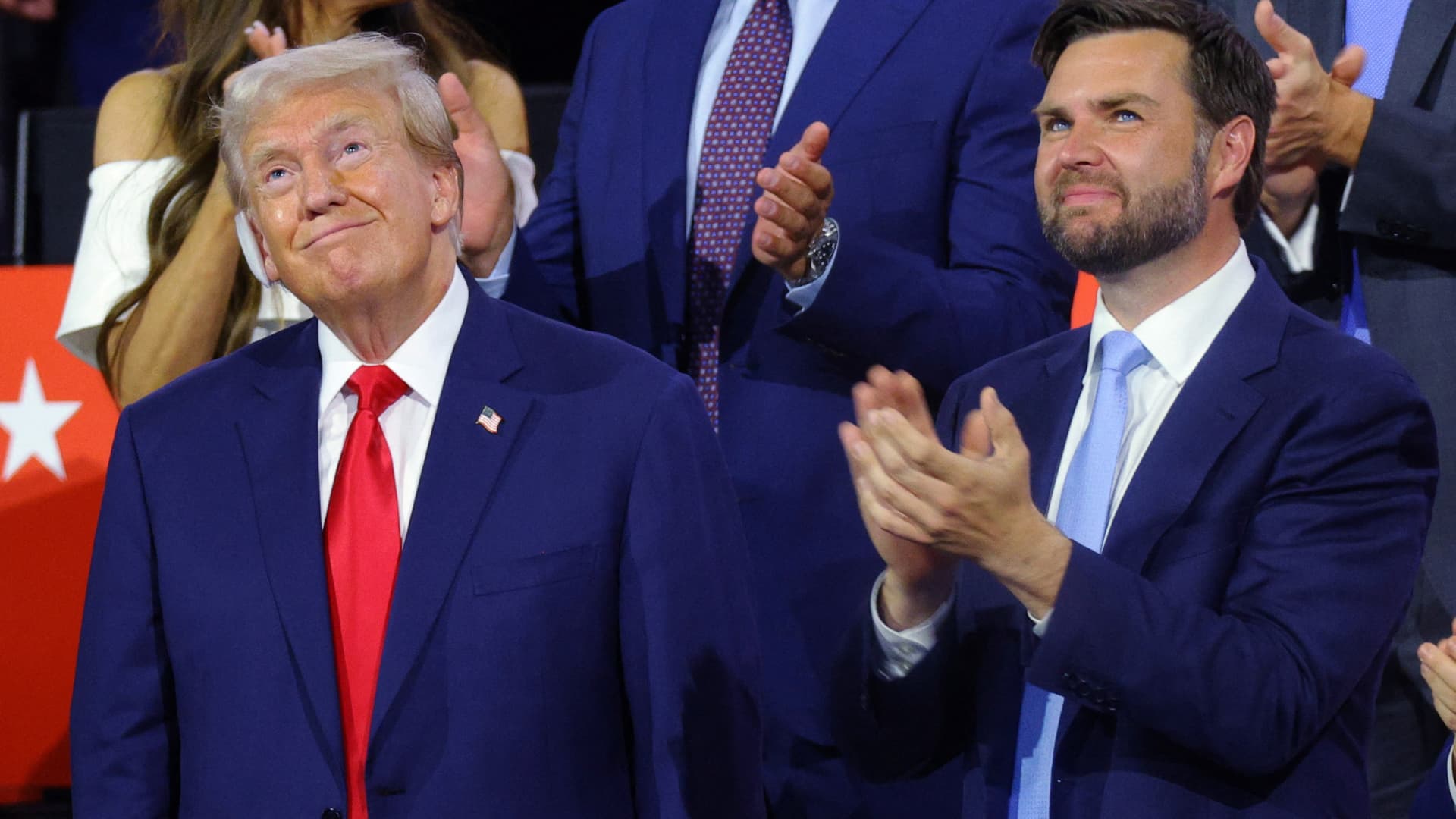 Trump lauded at Republican convention, his first public appearance since assassination attempt