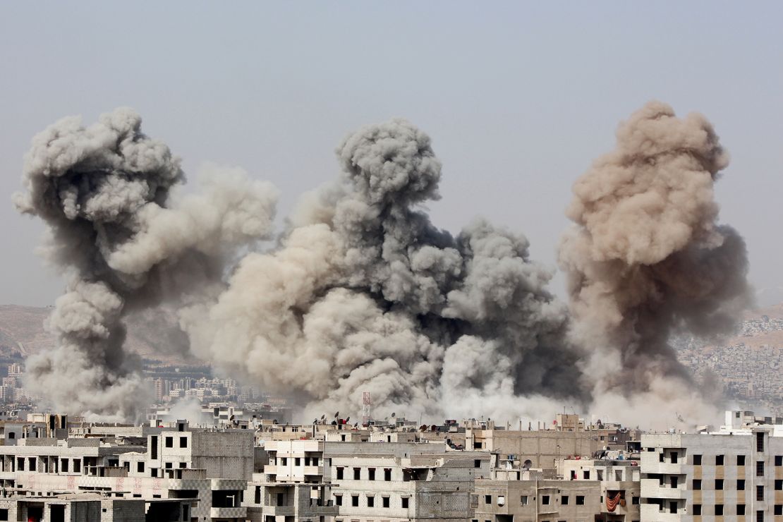 Smoke rises in Arbeen, in the eastern Damascus suburb of Ghouta, March 8, 2015.