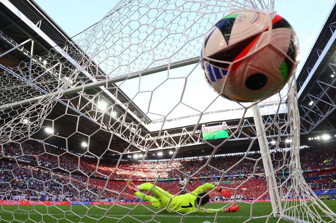 England's Ivan Toney scores a penalty past Switzerland's Yann Sommer.