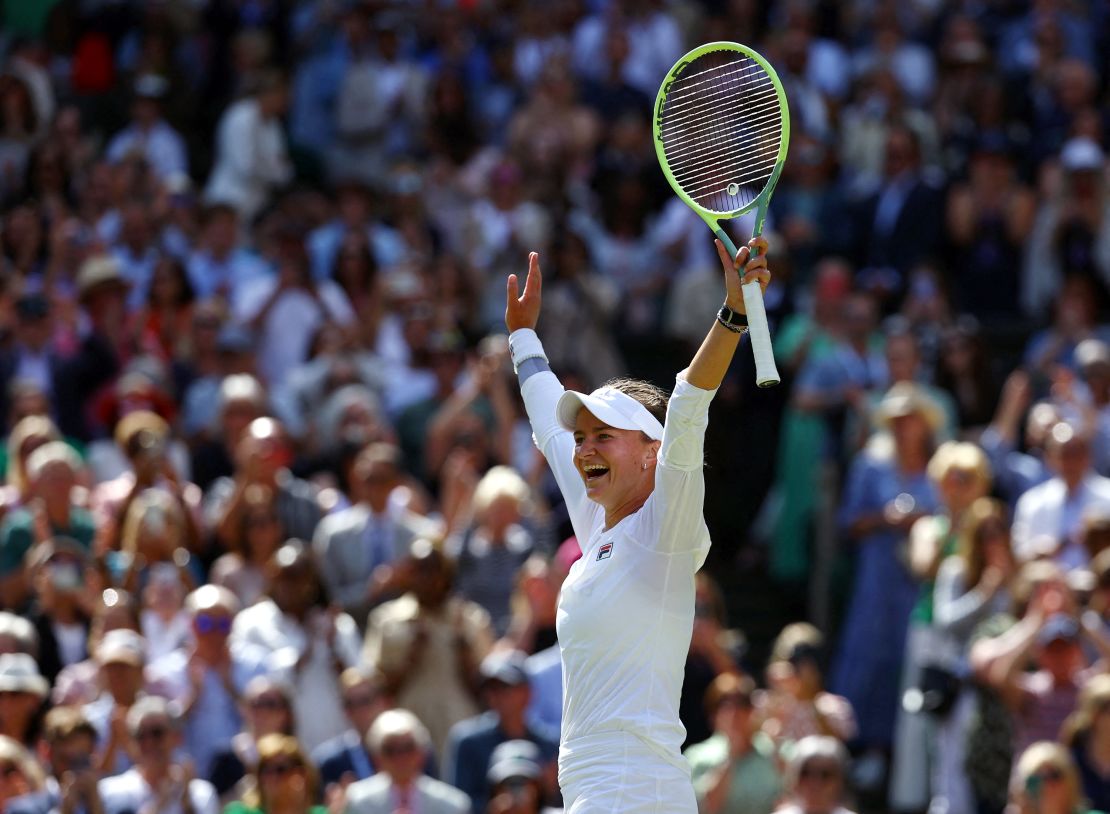 Barbora Krejčíková celebrates winning the Wimbledon final.