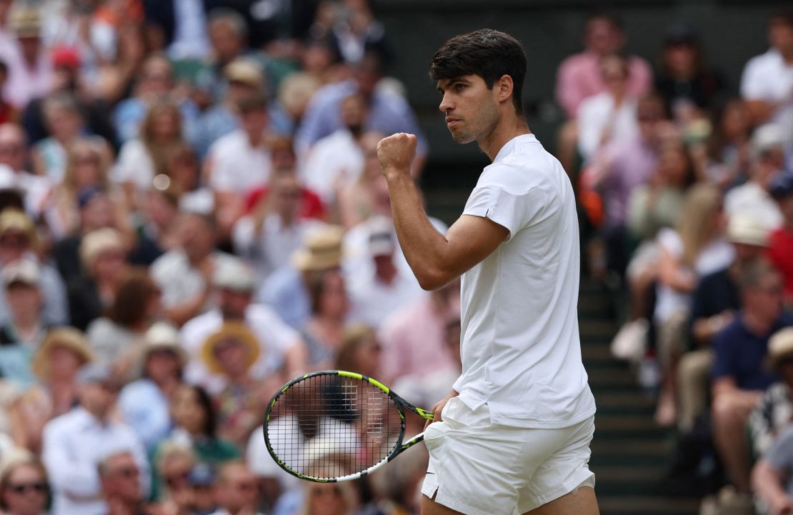 Alcaraz celebrates winning the second set.