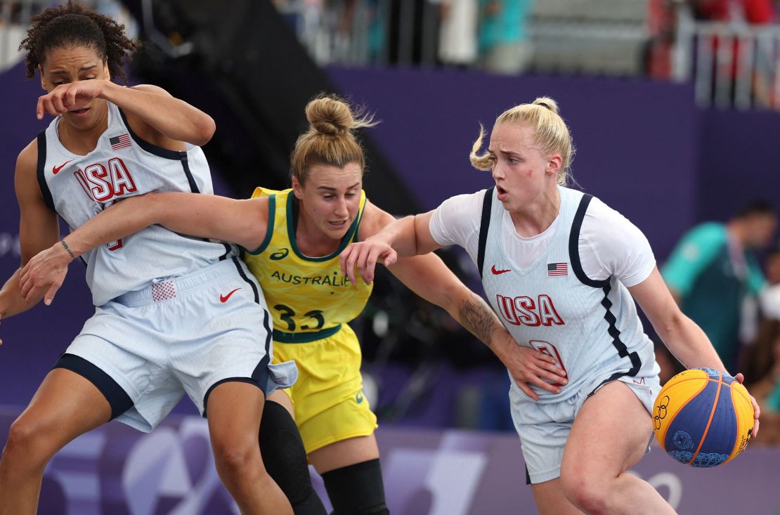 Van Lith and Burdick in action against Lauren Mansfield of Australia.