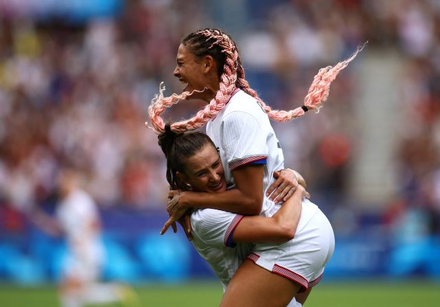 US forward Trinity Rodman celebrates with teammate Emily Fox after scoring the team's first goal against Japan during extra time in the quarterfinal match on August 3. The US team <a href="https://www.cnn.com/sport/live-news/paris-olympics-news-2024-08-03#h_8e0bb6ea63316728231cf3ccd5032466">advanced to the semifinals</a> with the win.