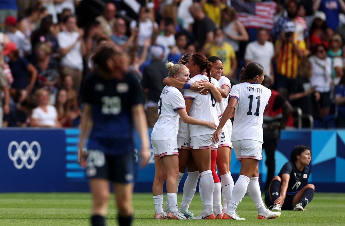 US players celebrate after beating Japan and advancing to the semifinal.