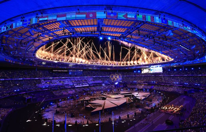 French singer Yseult performs "My Way" at the end of the Olympic closing ceremony as fireworks go off above the Stade de France on Sunday, August 11.