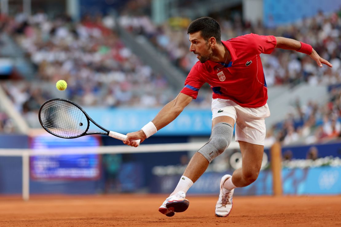 Serbia's Novak Djokovic plays against Lorenzo Musetti of Italy on Friday.