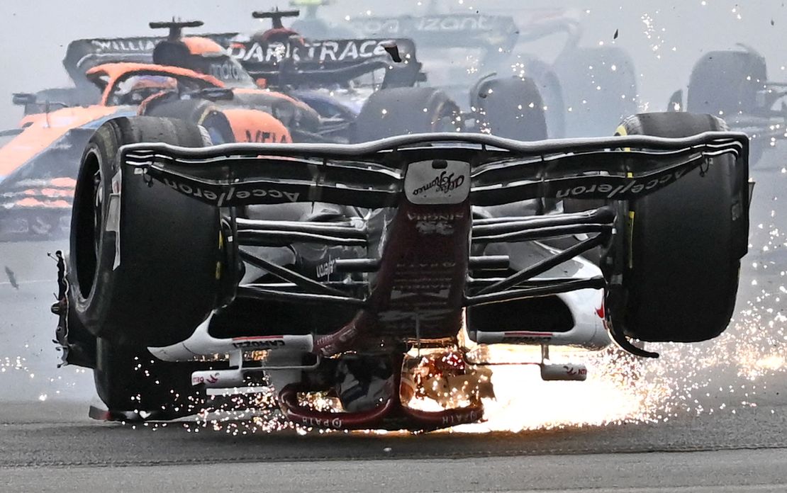 Zhou skids across the track after the first-lap collision.