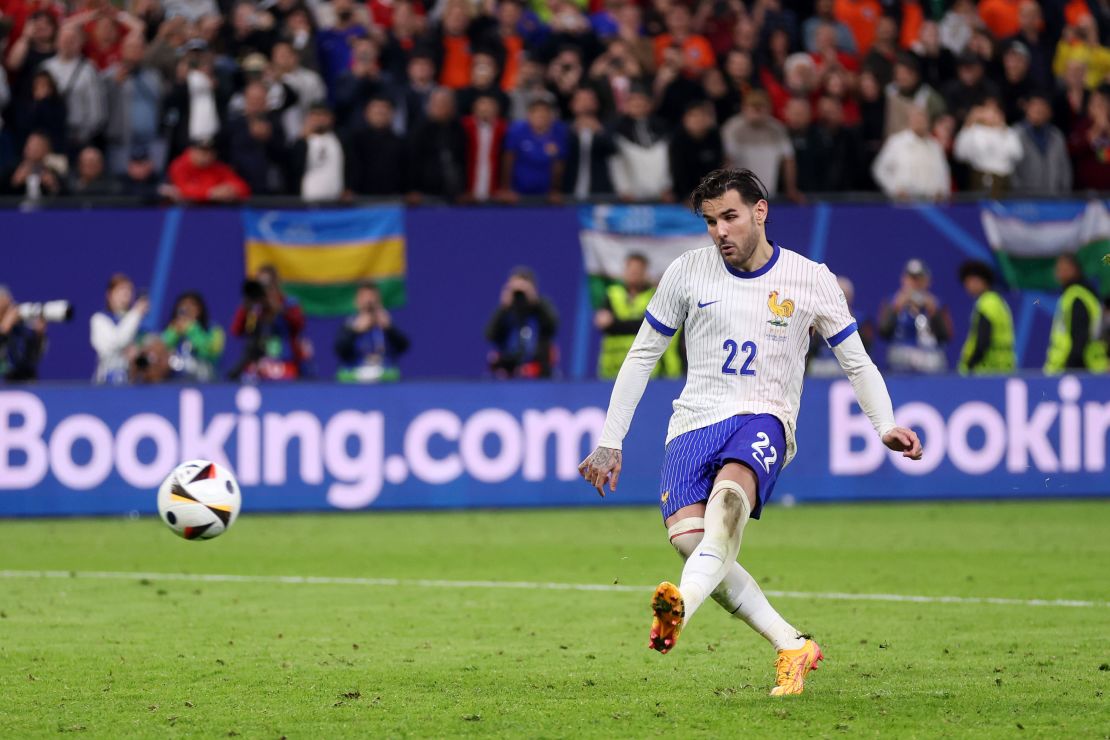 Theo Hernández scores France's winning penalty against Portugal.