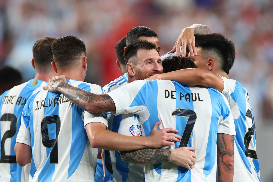 EAST RUTHERFORD, NEW JERSEY - JULY 09: Lionel Messi of Argentina celebrates with teammates Julian Alvarez and Rodrigo De Paul of Argentina after scoring the team's second goal during the CONMEBOL Copa America 2024 semifinal match between Canada and Argentina at MetLife Stadium on July 09, 2024 in East Rutherford, New Jersey. (Photo by Sarah Stier/Getty Images)