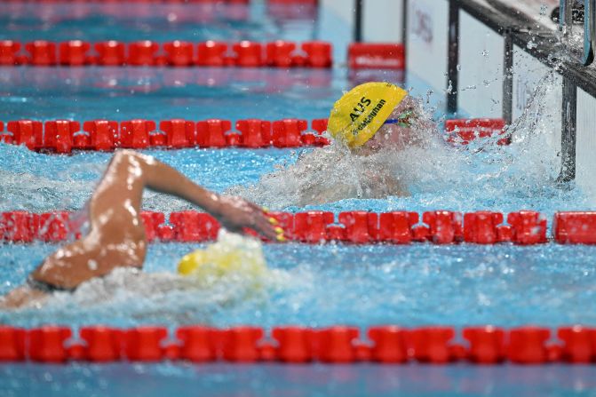 Mollie O'Callaghan beats fellow Australian Ariarne Titmus to the wall <a href="https://www.cnn.com/sport/live-news/paris-olympics-news-2024-07-29#h_0aaaff0ff5b036add4d10a8d8b387ce5">to win the 200-meter freestyle</a> on July 29. O'Callaghan finished in 1:53.27, topping Titmus’ Olympic record from three years ago. Titmus won the silver.