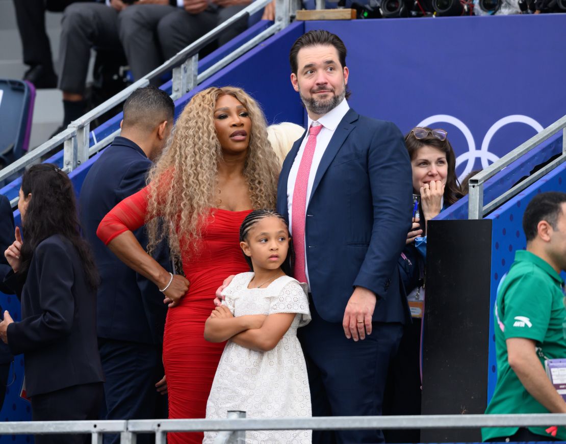 Serena Williams, Alexis Ohanian and their daughter Olympia attend the Opening Ceremony of the Olympic Games on July 26.