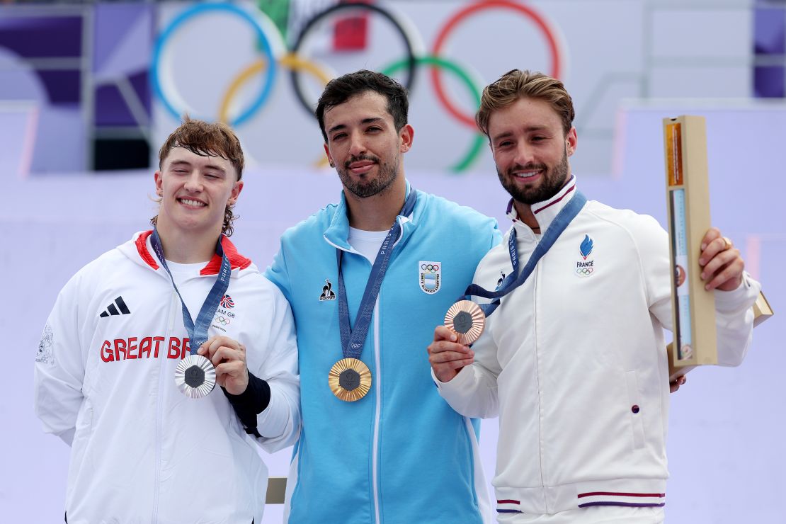 PARIS, FRANCE - JULY 31: Gold medalist Jose Torres Gil of Team Argentina (C), Silver medalist Kieran Darren David Reilly of Team Great Britain (L) and Bronze medalist Anthony Jeanjean of Team France (R) pose on the podium during the BMX Freestyle Men's Park Final on day five of the Olympic Games Paris 2024 at Place de la Concorde on July 31, 2024 in Paris, France. (Photo by Alex Broadway/Getty Images)