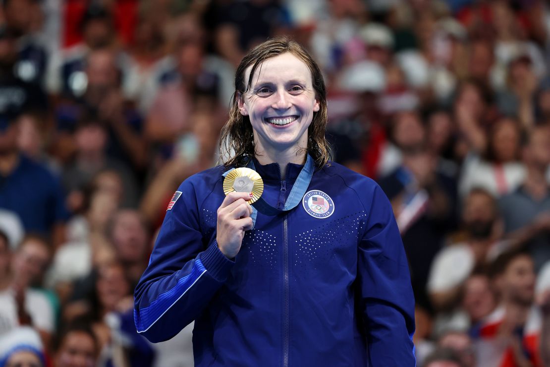 NANTERRE, FRANCE - JULY 31: Gold Medalist Katie Ledecky of Team United States poses on the podium during the Swimming medal ceremony after the Women's 1500m Freestyle Final on day five of the Olympic Games Paris 2024 at Paris La Defense Arena on July 31, 2024 in Nanterre, France. (Photo by Quinn Rooney/Getty Images)