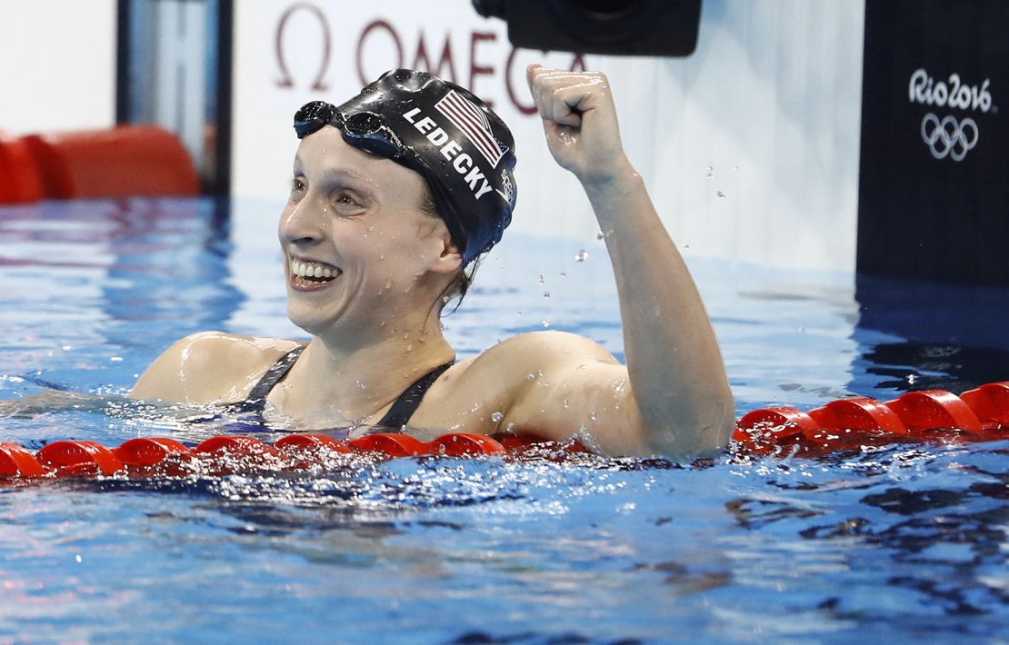 Katie Ledecky celebates after she broke the world record to win the women's 800m freestyle final at the Rio 2016 Olympic Games.