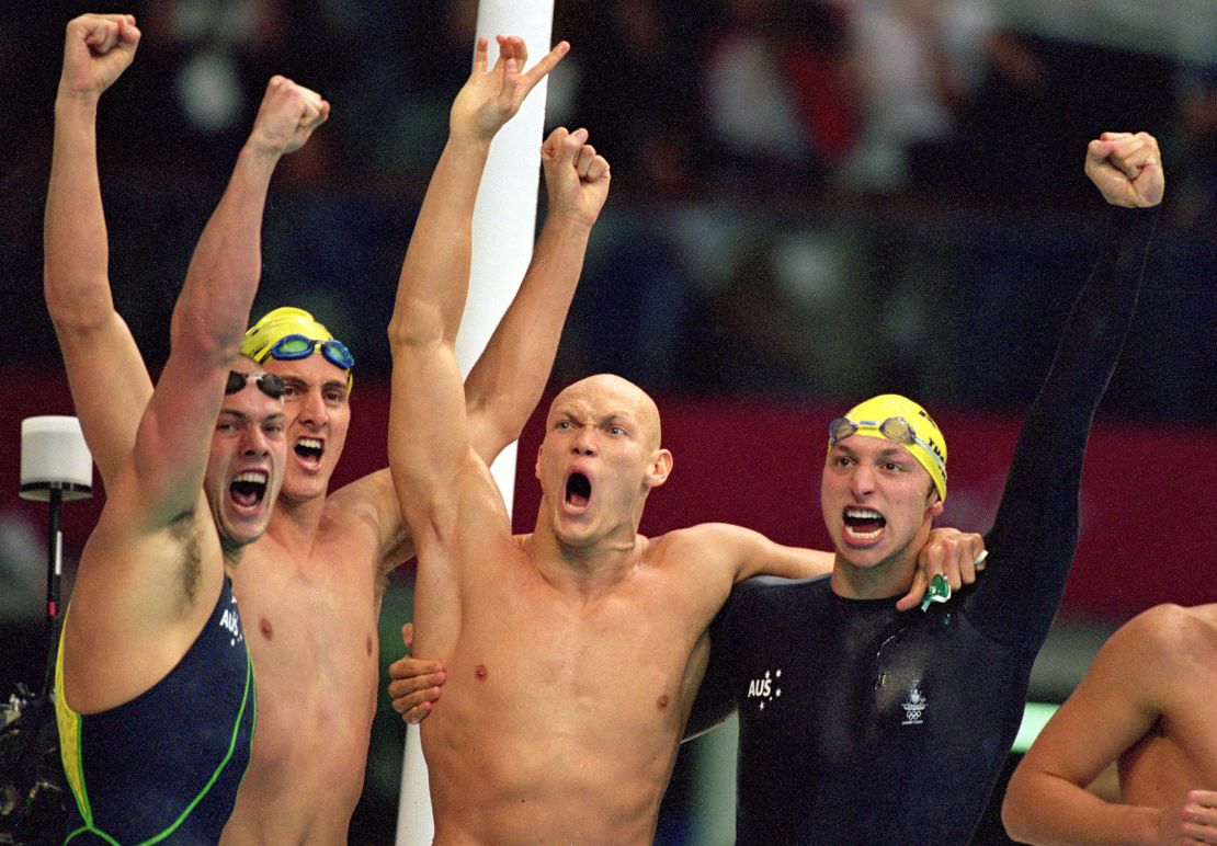 Ian Thorpe (right) celebrates 4x100m freestyle relay gold in Sydney.