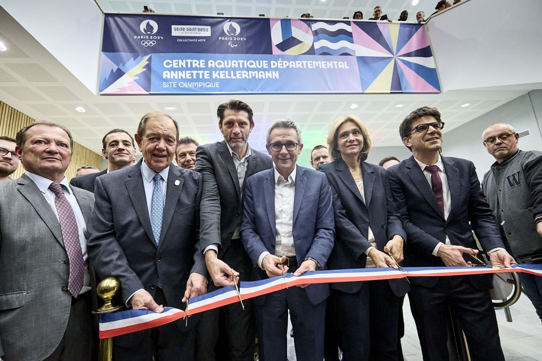 Stéphane Troussel (center) at the inauguration of the Annette Kellermann aquatics center at La Courneuve on February 6. The aquatics center will host training sessions for water polo teams during the Games.