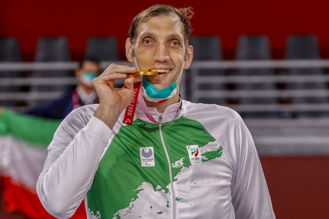 Mehrzad celebrates his second gold medal after Iran had beaten the Russian Paralympic Committee at the 2020 Tokyo Paralympic Games.