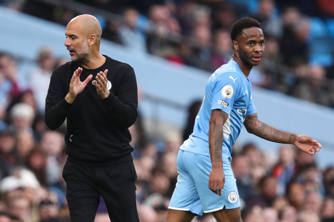 Manchester City boss Pep Guardiola and Sterling during a Premier League match against Burnley on October 16, 2021.