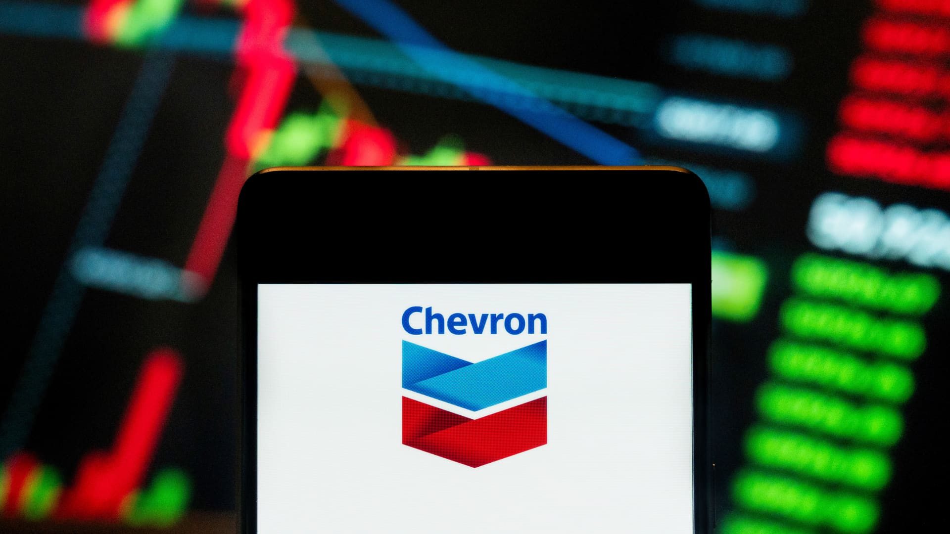 Stocks making the biggest moves midday: Chevron, Apple, Clorox, Amazon and more