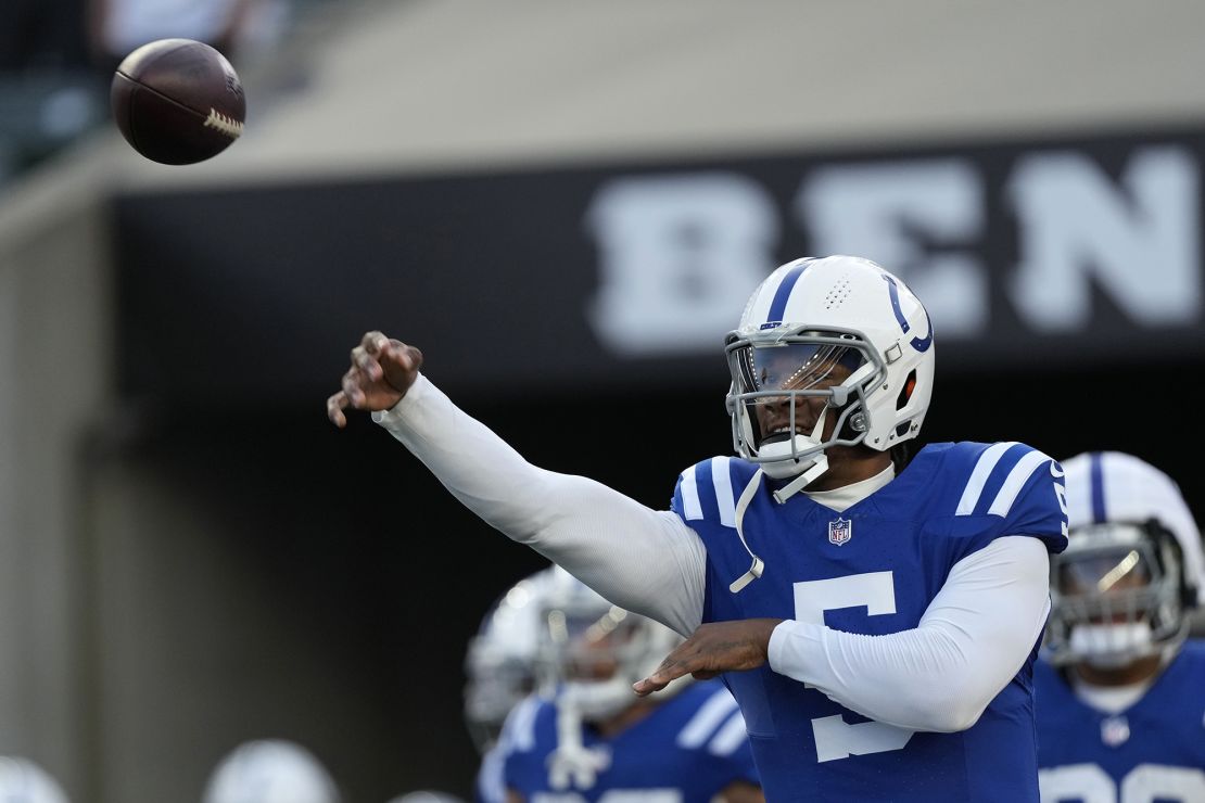 Richardson throws the ball during warmups.