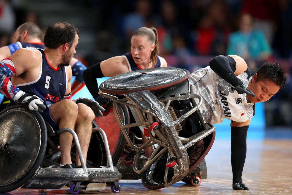 Team USA's Sarah Adam challenges Japan's Katsuya Hashimoto during the wheelchair rugby final at the 2024 Paralympic Games.