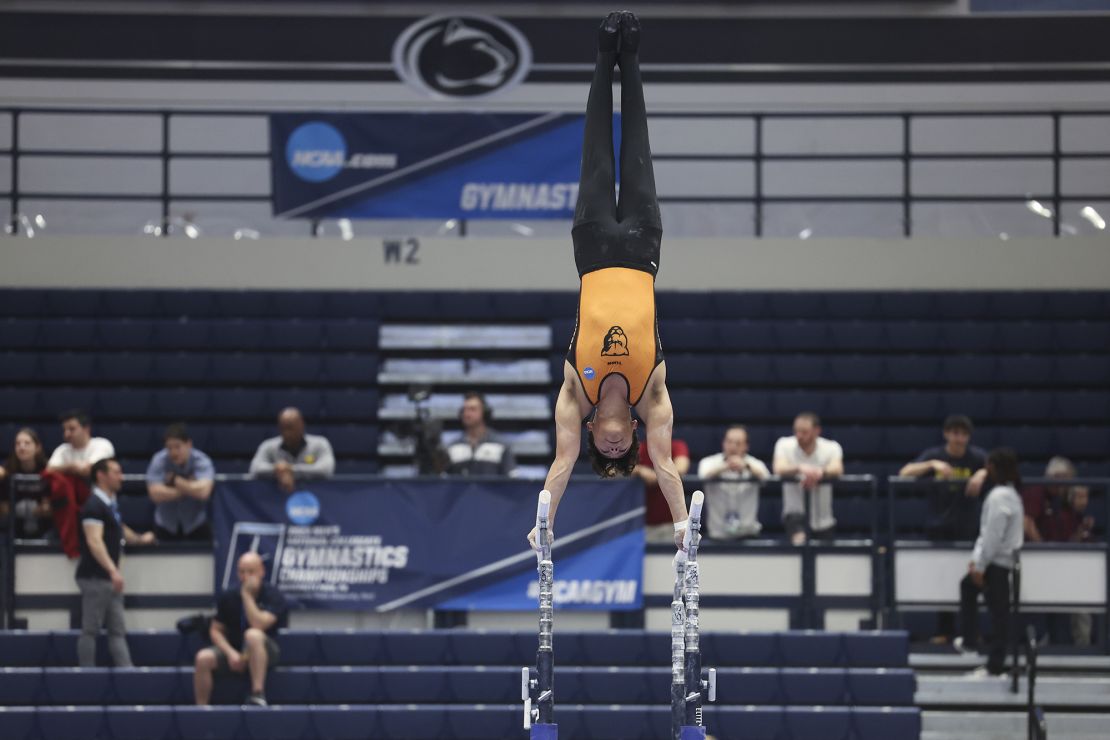 Koby Cantu of the Greenville Panthers competes on the parallel bars during the Division I Men's Gymnastics Championship on April 14, 2023, in University Park, Pennsylvania.