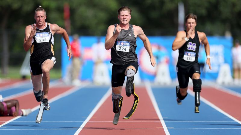 Hunter Woodhall watched his wife become Olympic champion in Paris. Now, he’s a Paralympic gold medalist