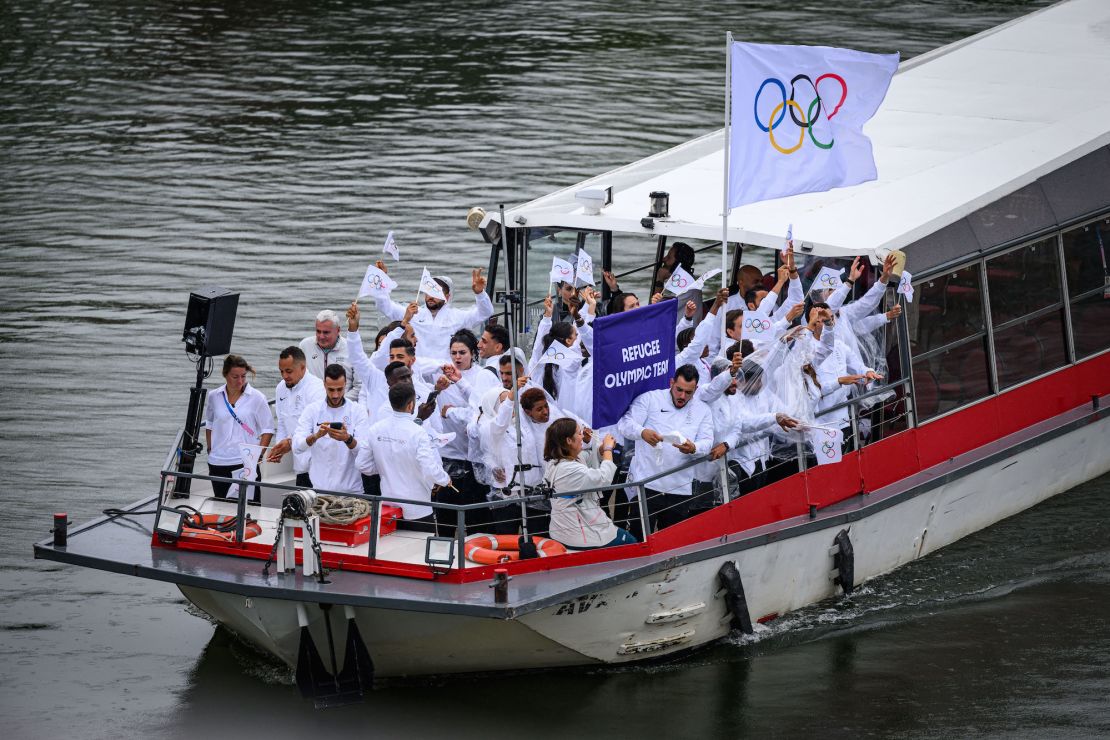 The Refugee Olympic Team travel down the River Seine during the opening ceremony.