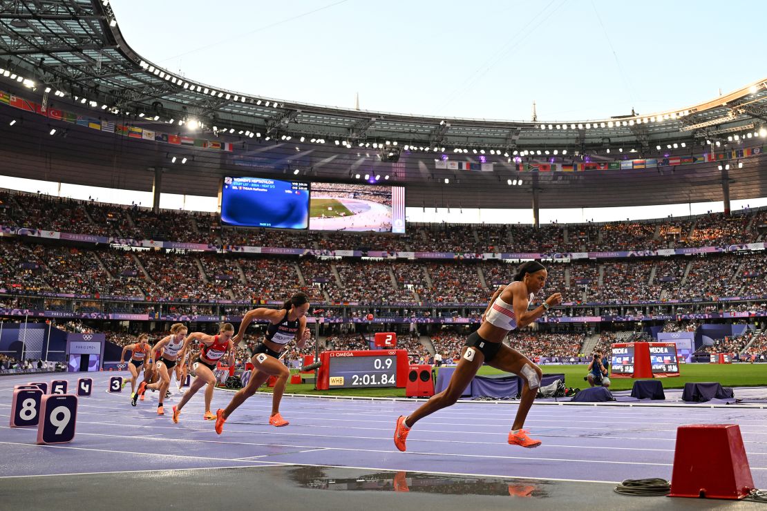 Thiam (R) running in the 800m of the heptathlon on August 9.