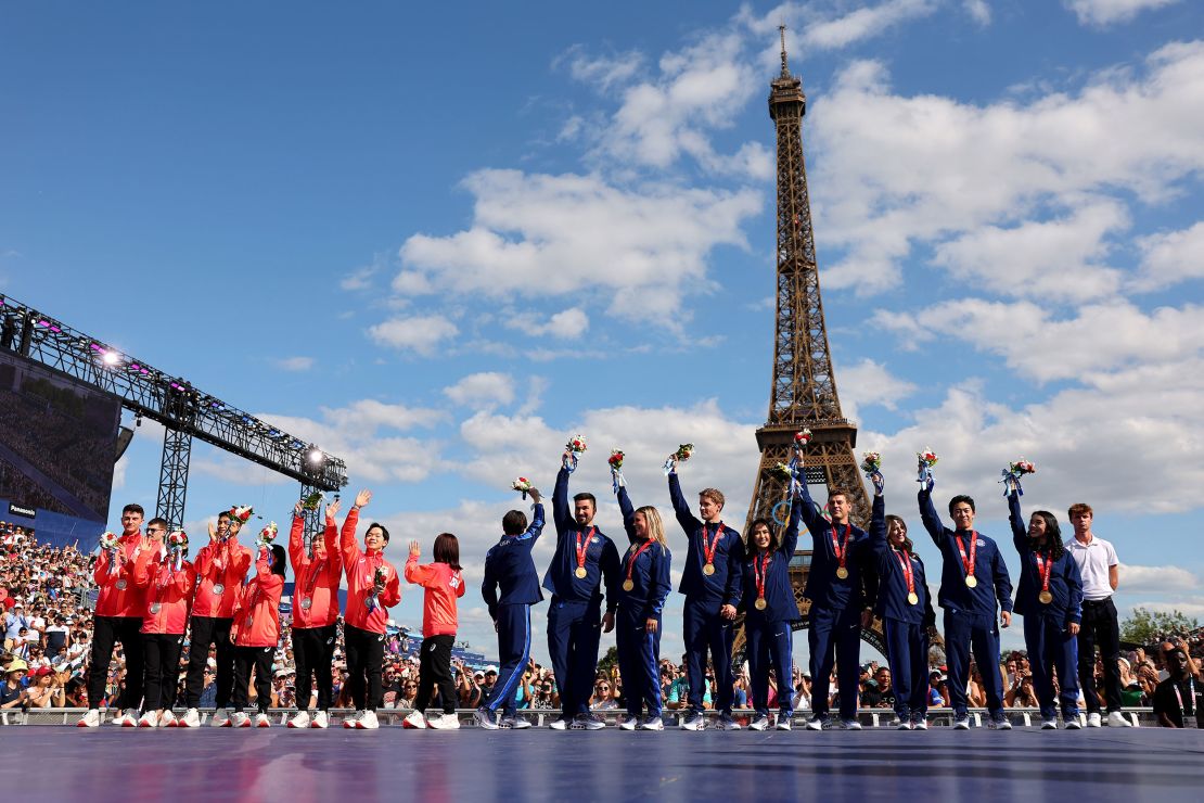 Japan was upgraded to silver and received its medals alongside the USA.