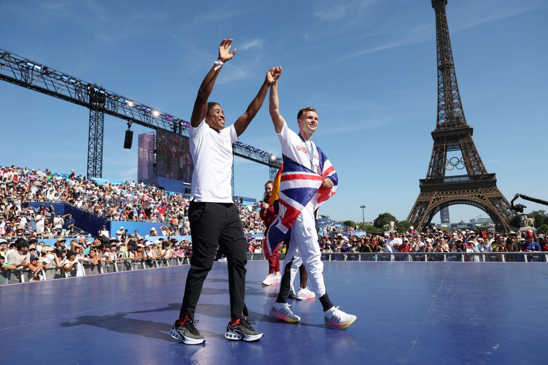 Ngamba and Lewis Richardson celebrate their medals during the Paris Olympics.