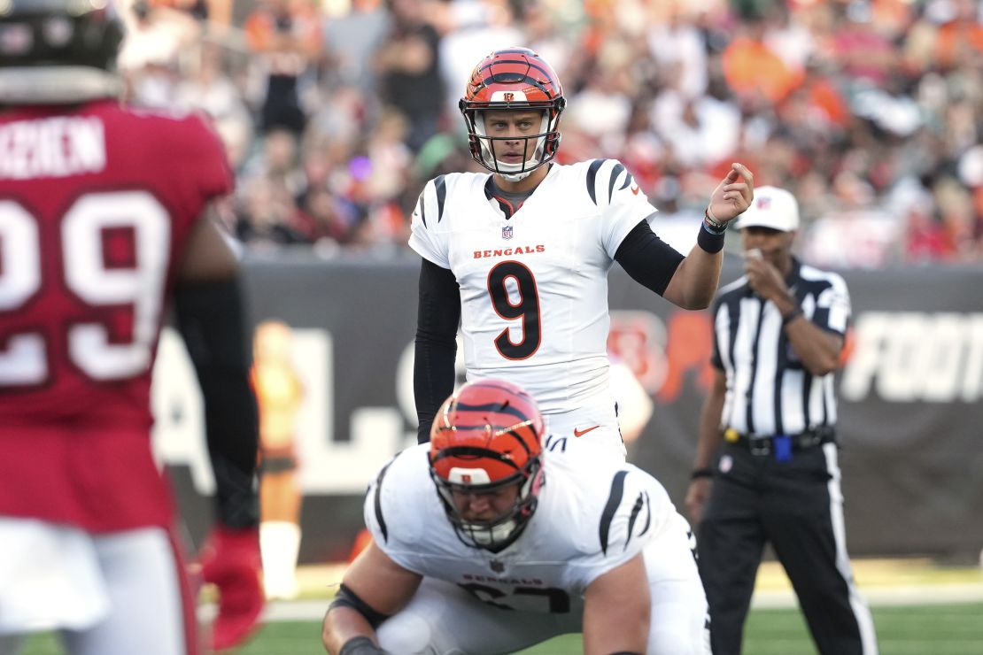 Burrow signals for motion during the first quarter of the preseason game against the Tampa Bay Buccaneers.